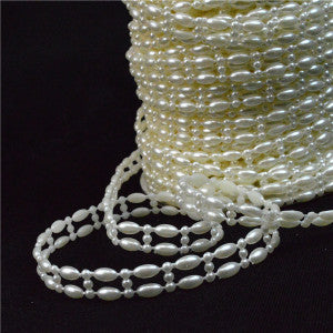 PEARL IVORY COLOUR POLY DOUBLE OVAL BEADS